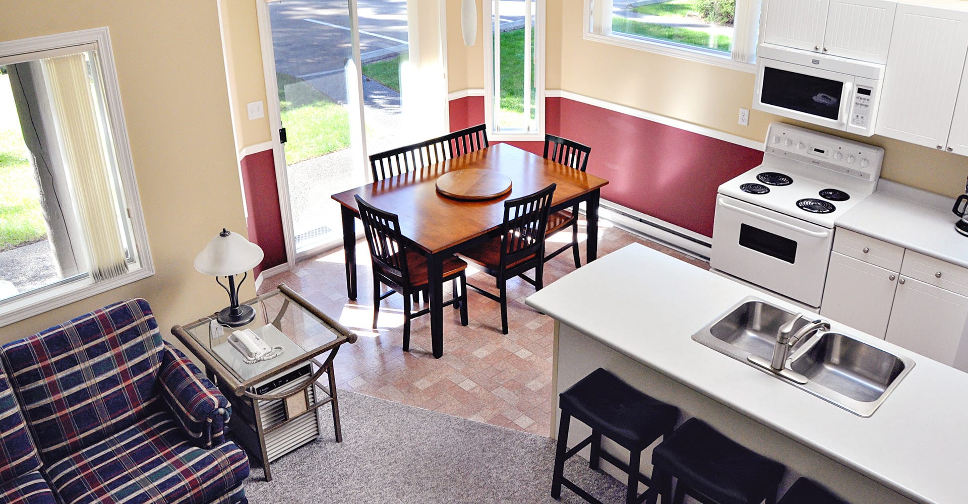 Kitchen and dining area in condo at Ocean Trails Resort