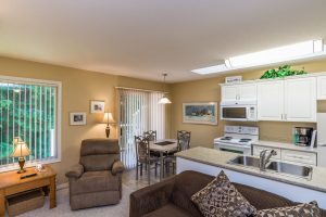 Kitchen, dining area and living room in condo at Ocean Trails Resort